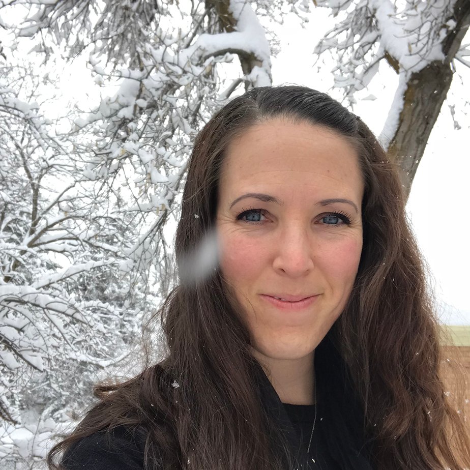 Woman in snowy forest