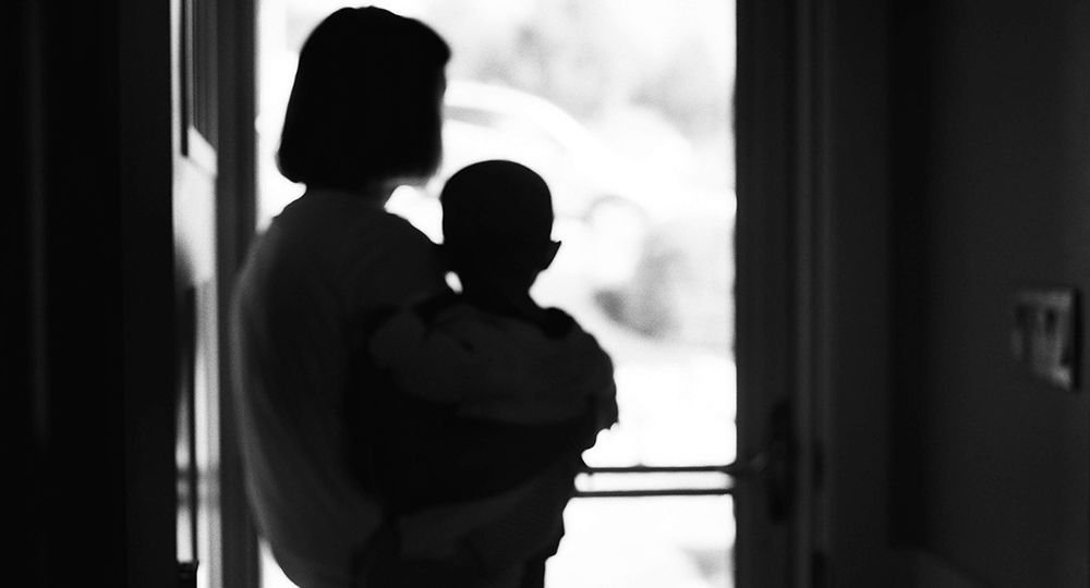 Mother and child in doorway