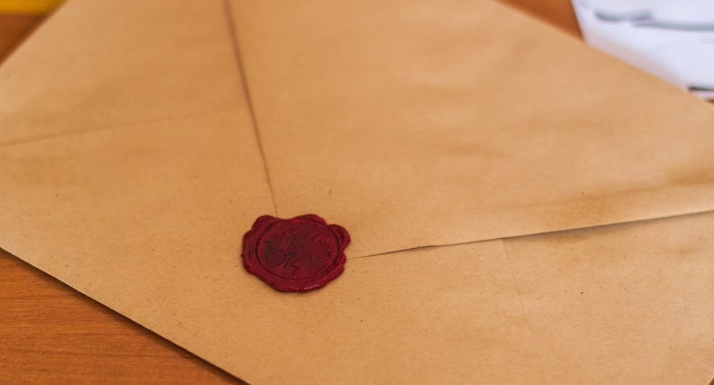 Brown envelope on kitchen table