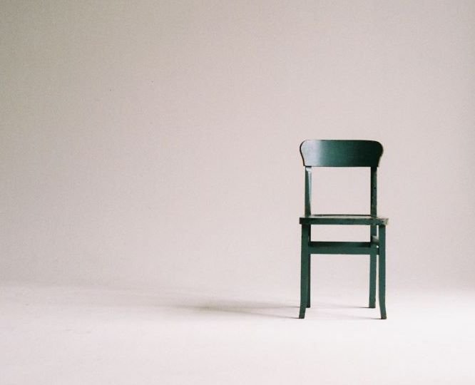 green-wooden-chair-on-white-surface (2)