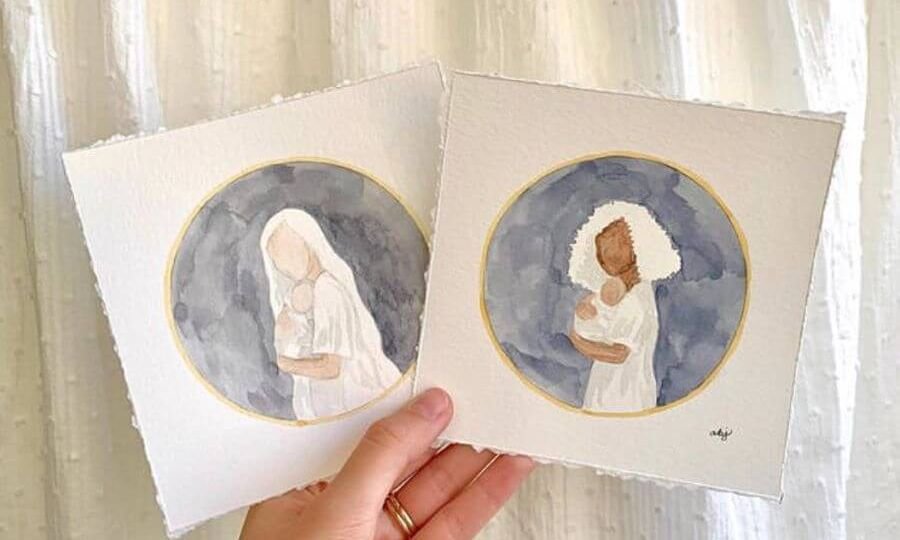 Two watercolor paintings of women clothed in white cradling babies